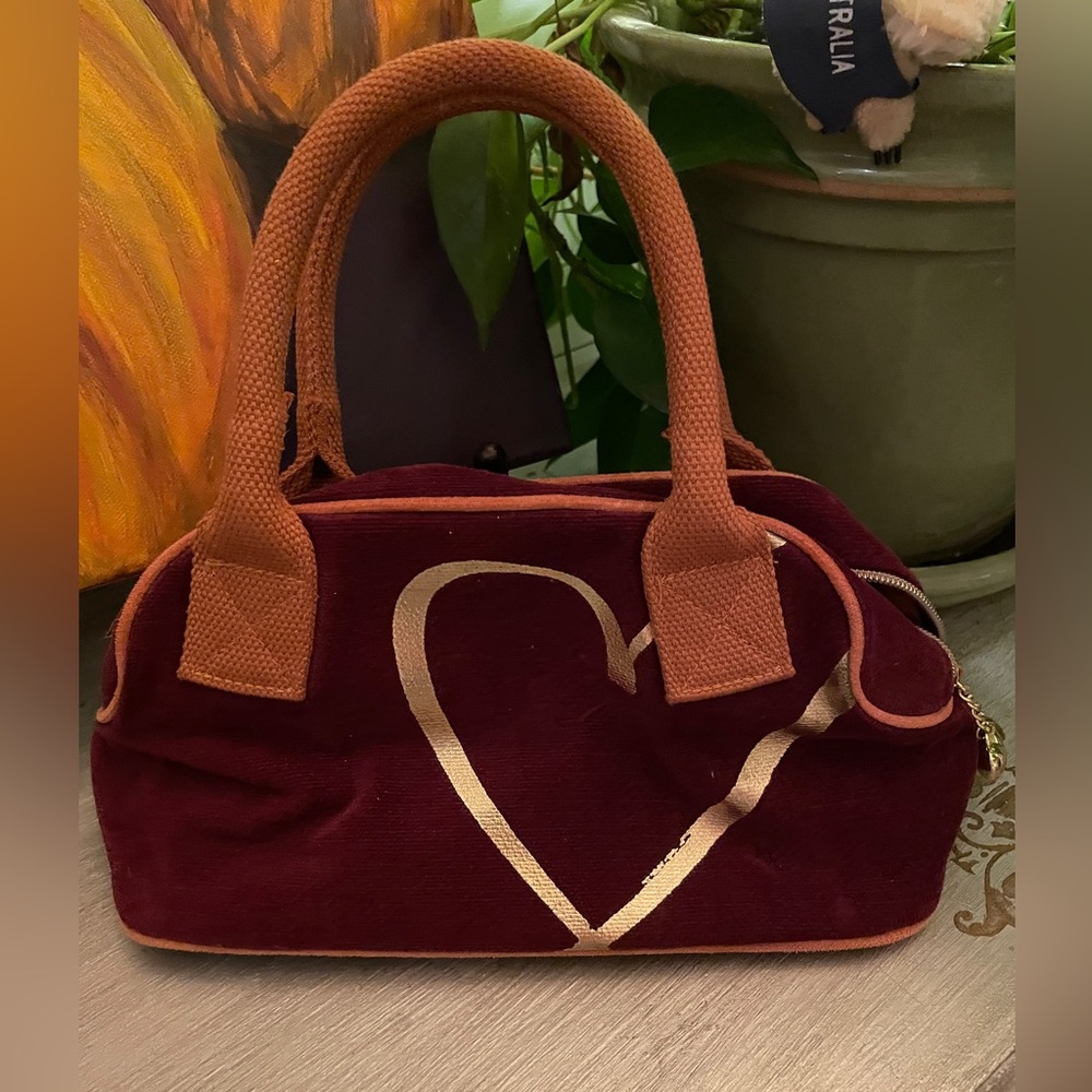 Vintage Y2K Victoria’s Secret gold and burgundy handbag.